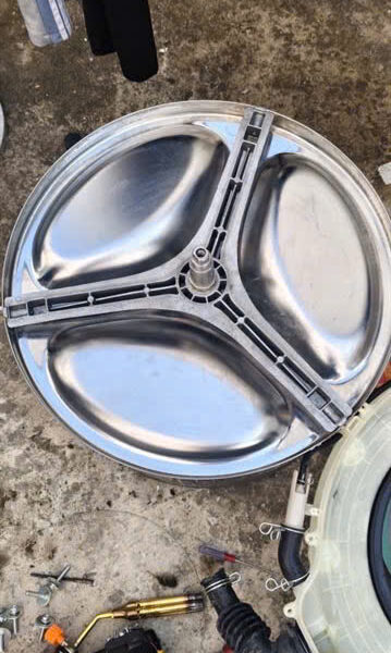 Trục càng chảng ba máy giặt Sharp