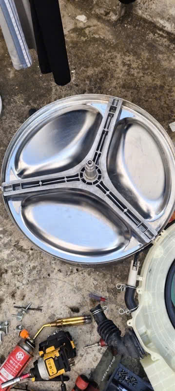 Trục càng chảng ba máy giặt Sharp